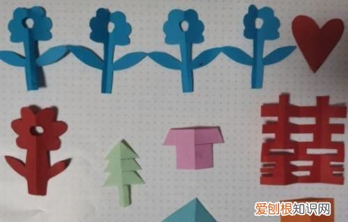 手工剪纸画板图形怎么剪，剪轴对称图形漂亮图片教程