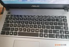 华硕笔记本键盘字母变数字怎么按回来