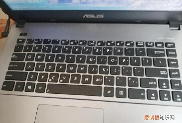 华硕笔记本键盘字母变数字怎么按回来